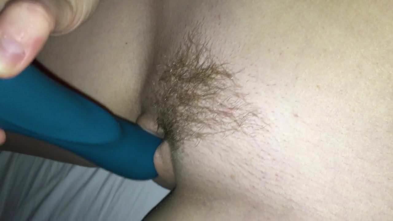 Wife masturbates trimmed bush pussy with vibrator