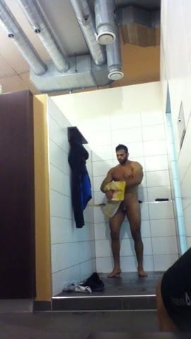 toweling off after shower in the gym