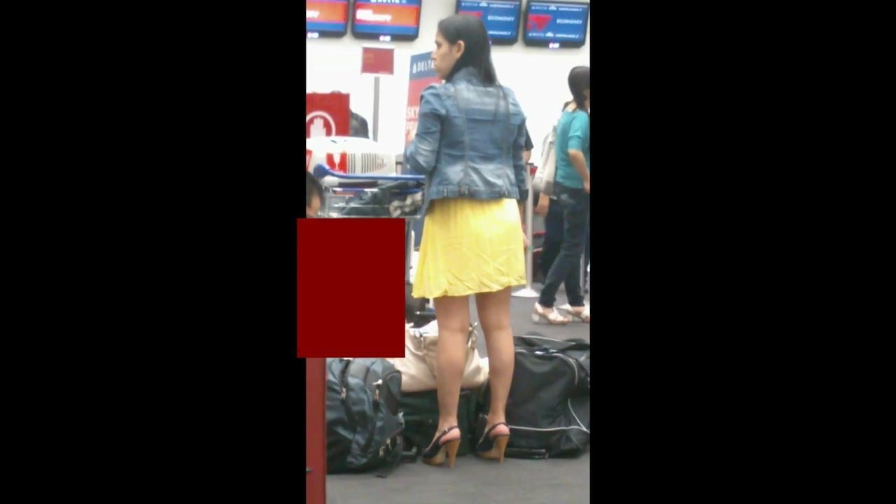 yellow skirt at the airport