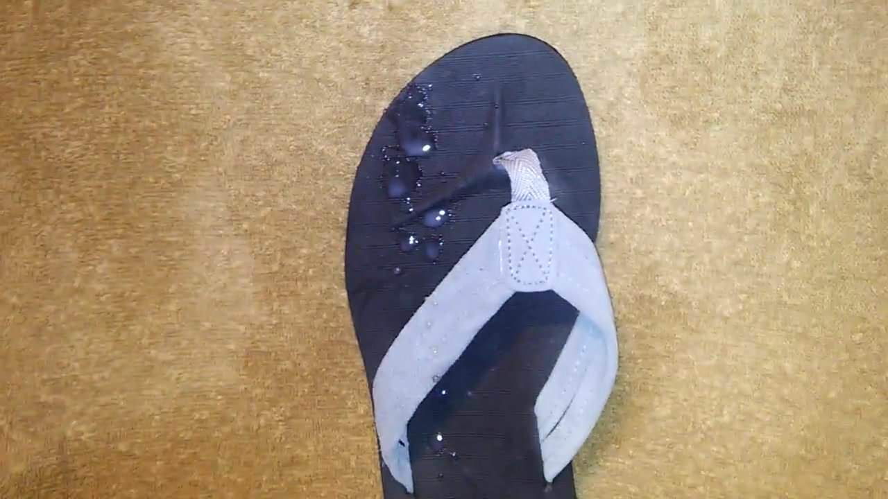 Used flip flop covered in cum