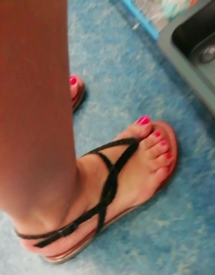 Candid mature feet In the store 