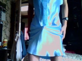 Contact of penis with soft blue satin chemise.