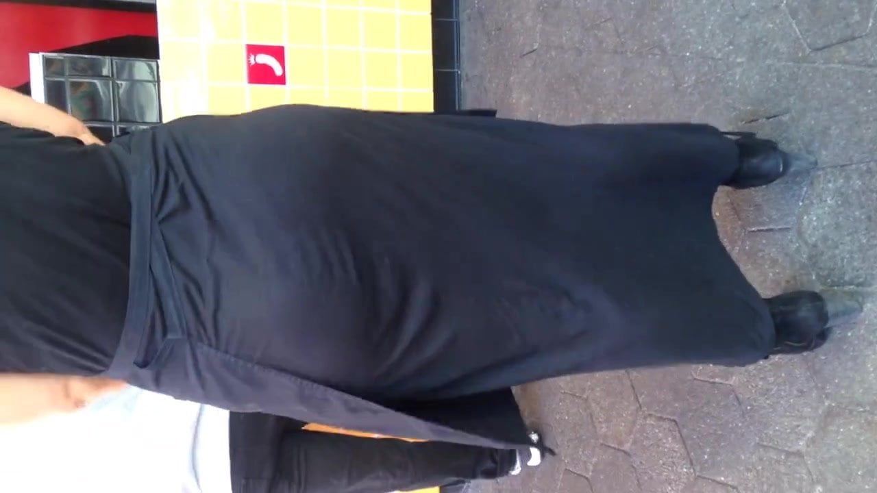 Big ass in long black dress
