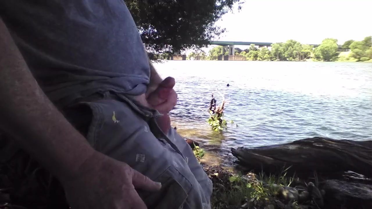 Lonely Bear wanking by the river