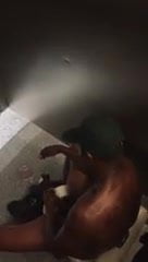 Black guy caught jerking big greasy cock in restroom