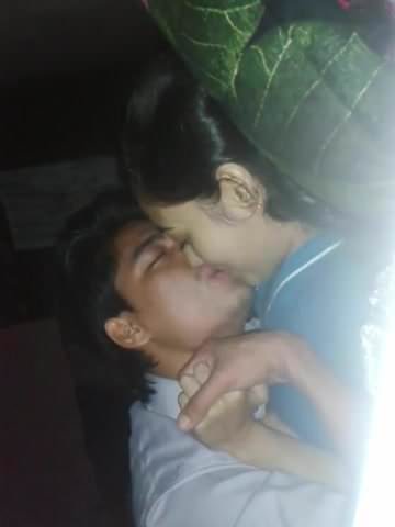 teen couple kissing 