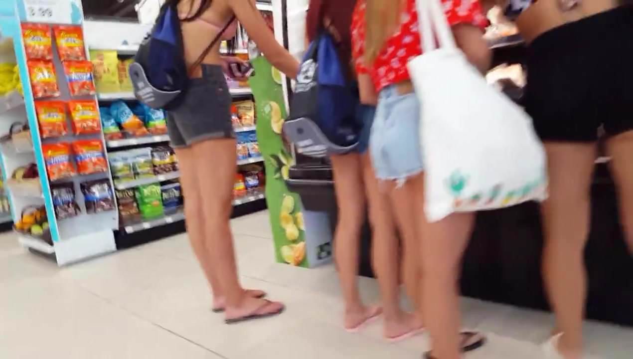 Candid voyeur thick short latinas showing cheeks shopping