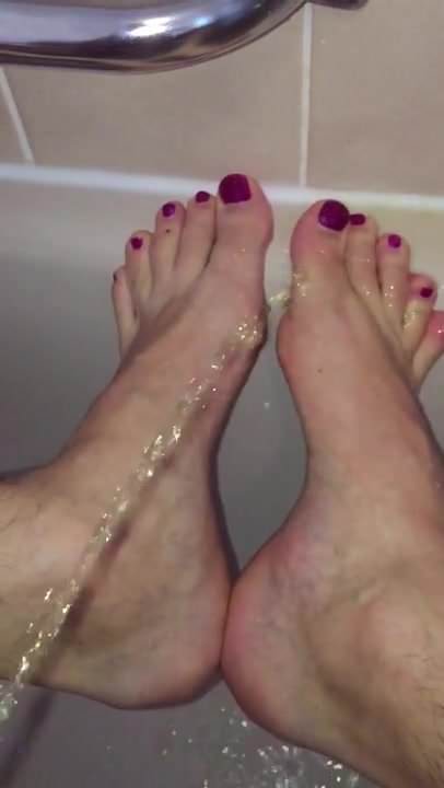 Pissing on pretty naked feet