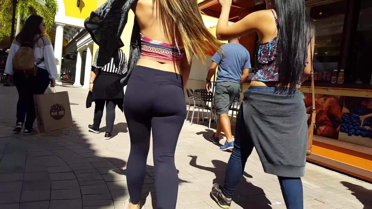 Candid voyeur teen exposed belly leggings ass