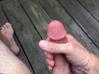 Jerking off outside on the patio
