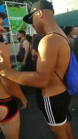 Sexy Brunette Blows A Guy In Public